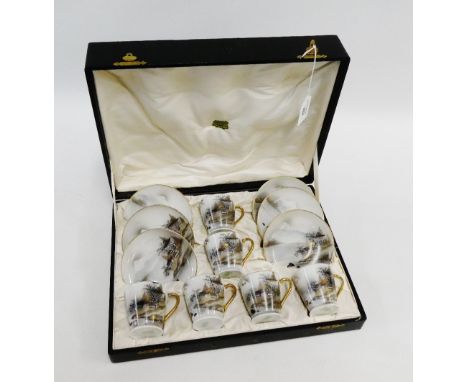 Japanese porcelain cased coffee set comprising six cups and six saucers in a fitted case