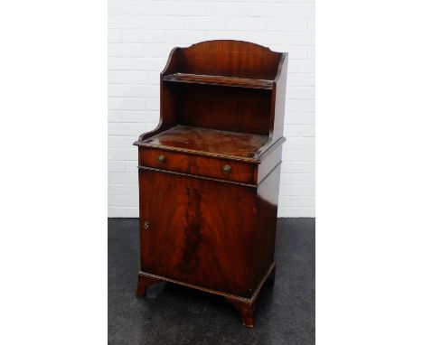 Mahogany cabinet with a single drawer above a cupboard door on bracket feet, 111 x 52cm