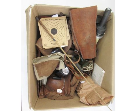 Three canvas and leather gun carrying slings, a small cartridge case, a sleeve with suede pad for rifle shooting, other canva