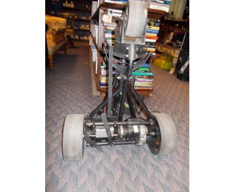 POWER ASSISTED GOLF CADDY
comprising wheels and power pack.
Overall good condition. General wear from use. 