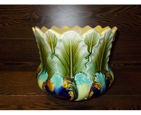 LARGE CERAMIC PLANT POT
in the style of Doulton Lambeth, marked 'New Leaf' to base, with leaf design and bright blue/green co