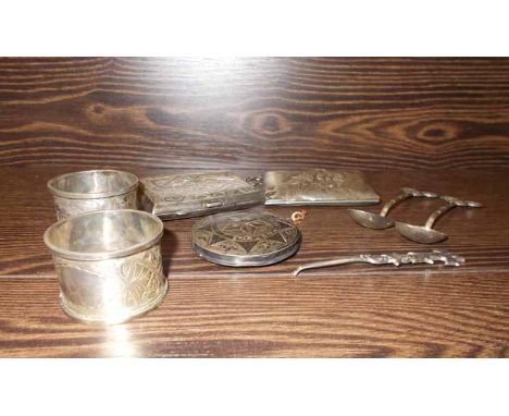 SILVER PURSE
with silver cigarette case, compact, pair of chinese silver teaspoons and a pair of cased silver napkin rings (1