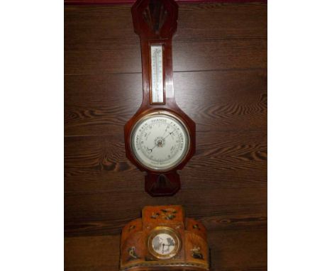 MAHOGANY WALL BAROMETER
together with a Chinese style painted burr walnut veneered mantle clock, barometer 61cm long
Some dam