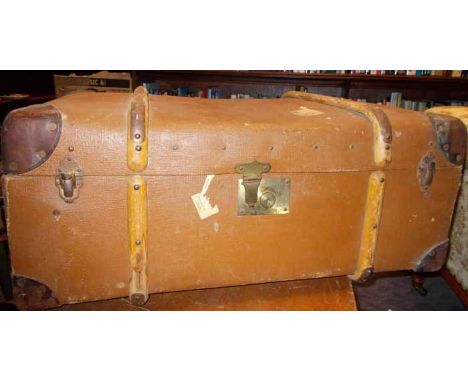 LARGE CANVAS AND LEATHER CORNERED TRAVEL TRUNK
Flaxite Foundation label, two leather handles, 79cm long
Fair condition