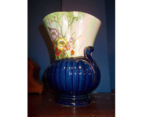 CROWN DEVON LUSTRE GLAZED SHOULDERED OVIFORM VASE
with blue gadrooned lower body, fluted neck with cream lustre with floral d