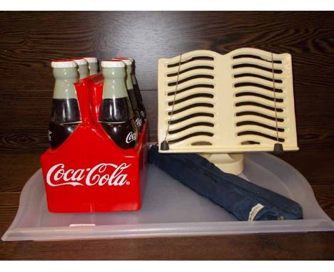 CERAMIC COCA COLA COOLER
together with a cast iron kitchen cookbook holder, two japanese recorders etc., cooler 23cm long
Not