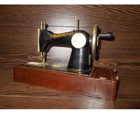RUSSIAN VINTAGE SEWING MACHINE 
on a bakelite base