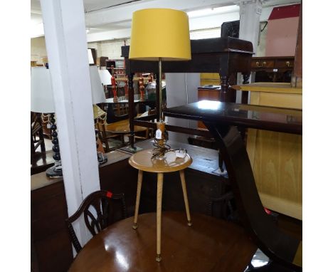 A mid-century standard lamp with integrated shelf, on tripod legs, height including shade 160cm