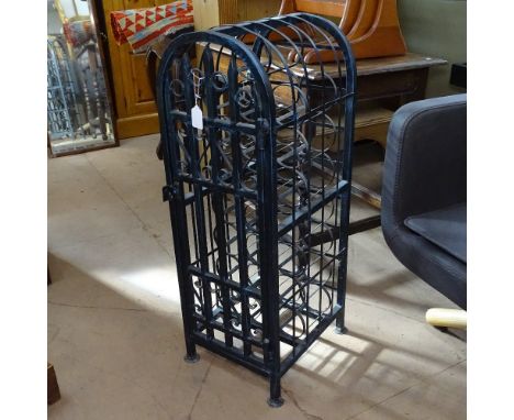 A scrolled wrought-iron arch-top wine cabinet for 22 bottles, height 87cm 