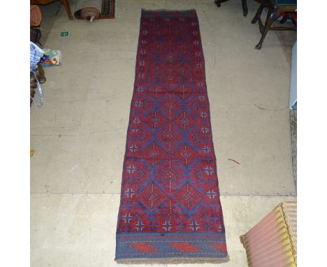 A Meshwani red ground runner, 264cm x 65cm 