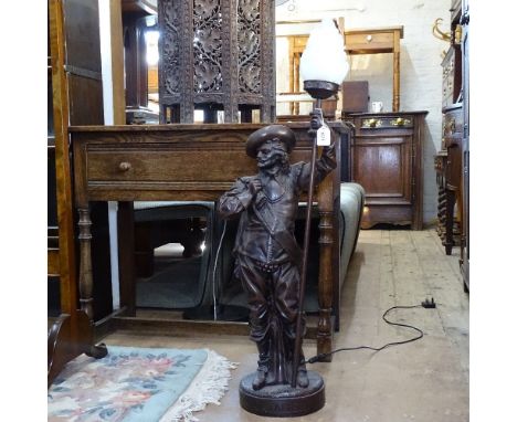 A Dutch Judendstill plaster figure of a cavalier table lamp, with flame glass shade, height including shade 100cm 