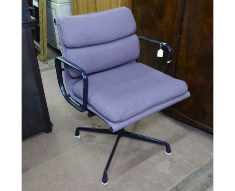 A 1980s Charles Eames Hermann Miller Soft Pad Office Chair, in pink fabric, with black enamelled frame, with screw-height adj