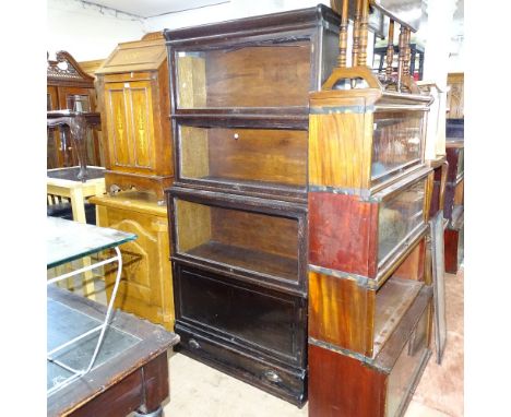 An early 20th century oak 4-section Globe-Wernicke style bookcase, with drawer-fitted base, W87cm, H80cm, D36cm 