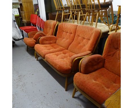 A mid-century Ercol beech-framed 3-piece suite, comprising a 2-seater settee and a pair of matching armchairs, with loose cus