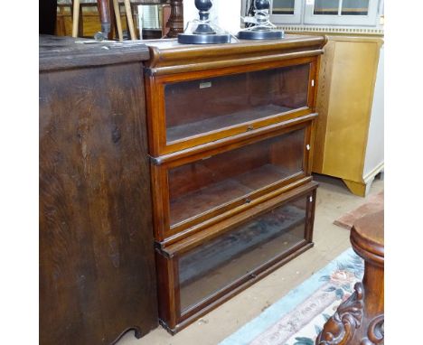 An early 20th century mahogany 3-section Globe-Wernicke bookcase, with oak top (no base), W87cm, H97cm, D27cm 