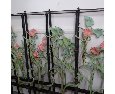 A French wrought-iron 2-section garden railing, with scrolled floral decoration, H121cm, overall length 310cm 