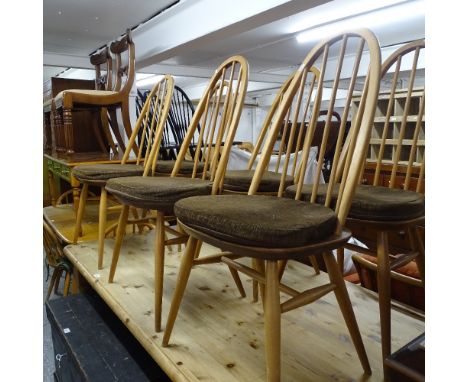 A set of 6 Ercol elm-seated stick-back dining chairs 
