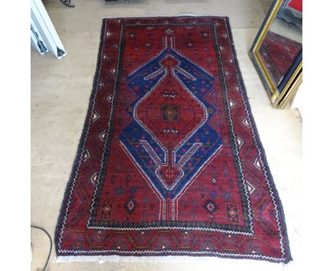 A red ground Beluchi runner 