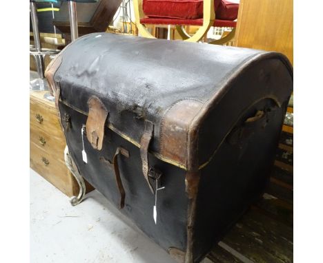A Victorian dome-top leather-bound travelling trunk, with fitted tray 