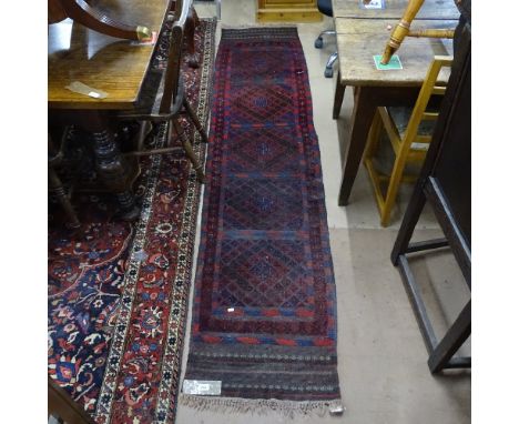 A Mamainer red ground runner, 260cm x 56cm 