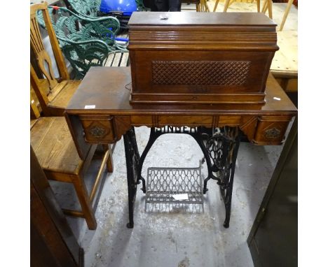 A Vintage Singer treadle sewing machine 