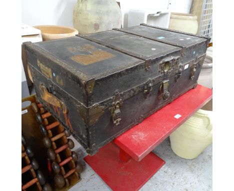 Innovation, a Vintage travelling wardrobe/trunk, with metal bands and leather carrying handles 