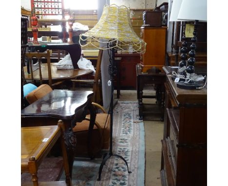A wrought-iron standard lamp, with Vintage rag strip shade, height including shade 155cm 