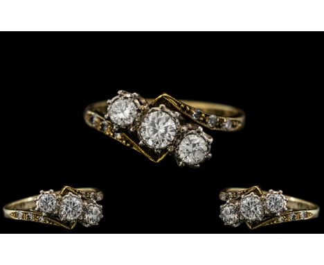 18ct Gold - Attractive and Good Quality 3 Stone Diamond Set Ring, With Diamond Shoulders. c.1930. The Three Round Brilliant C