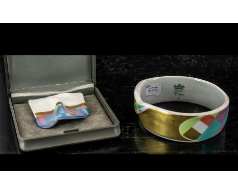 Two Pieces of Rosenthal Studio Line Jewellery, comprising a porcelain brooch and matching bangle.