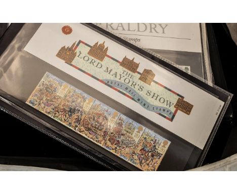 1 Album of First Day Covers - Royal Mail Mint Stamps. Includes British Films, St. John Ambulance, Flowers, Safety at Sea, Cat