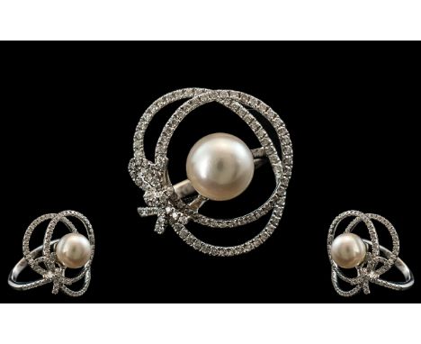 18ct White Gold Diamond And Pearl Ring Central 8.5mm Cultured Pearl, Surrounded By Round Modern Brilliant Cut Diamonds In A M