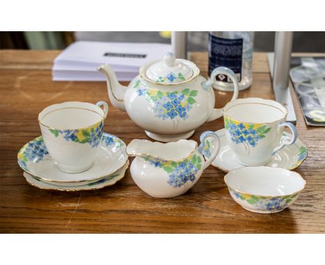 Grafton Handpainted Tea Service, comprising a tea pot, milk jug, sugar bowl, two tea cups and two saucers, and one side plate