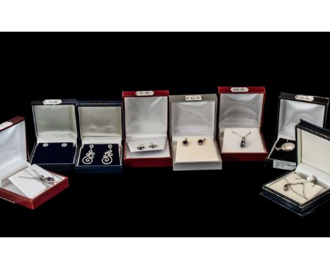 Collection of Silver 925 Jewellery Items with Boxes, Includes Earrings, Pendants with Necklaces and First Holy Communion Lock