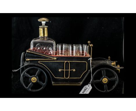 Vintage Musical Box in the form of a Rolls-Royce Old Timer Car fitted with a Decanter and six glasses. Music plays when decan