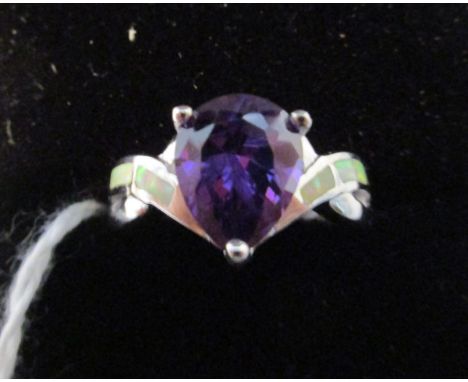 Silver stone set ring with large heart shaped amethyst