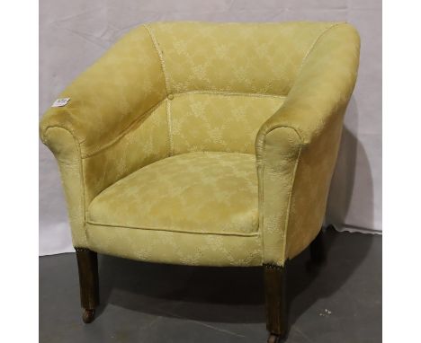 An early 20th century upholstered tub chair with ceramic castors. Not available for in-house P&amp;P, contact Paul O'Hea at M