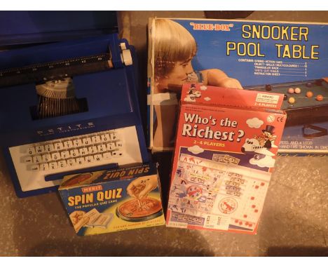 Collection of mixed vintage games and a Petite typewriter. Not available for in-house P&amp;P, contact Paul O'Hea at Mailboxe