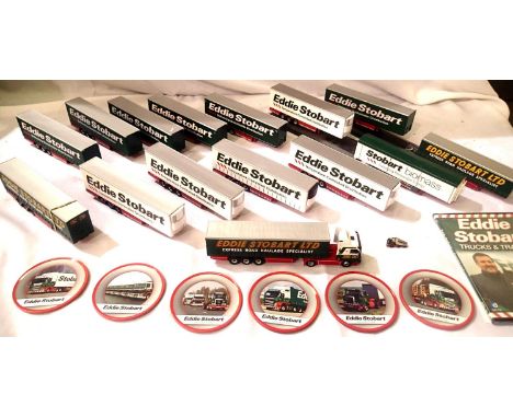 Fifteen Oxford/Atlas editions Stobart Artic Trailers and one tractor unit set of coasters, badge and DVD. P&amp;P Group 2 (£1