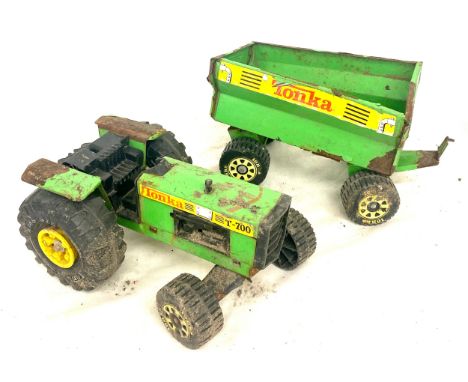 Vintage used tin Tonka tractor and trailer 