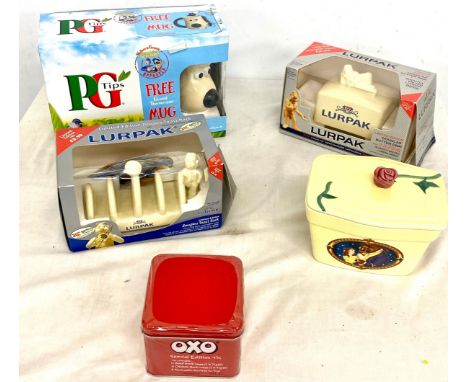 Boxed vintage Lurpak toast rack, butter dish, Beauty and the Beast clover lidded dish( small chip to rim), Oxo tin 