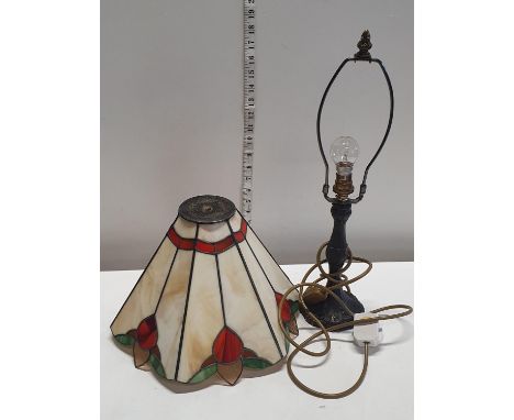 A tiffany style lamp shade with an Art Nouveau style lamp base. shipping unavailable 