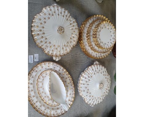 A 22 piece Spode Fleur de lys gold dinner service 