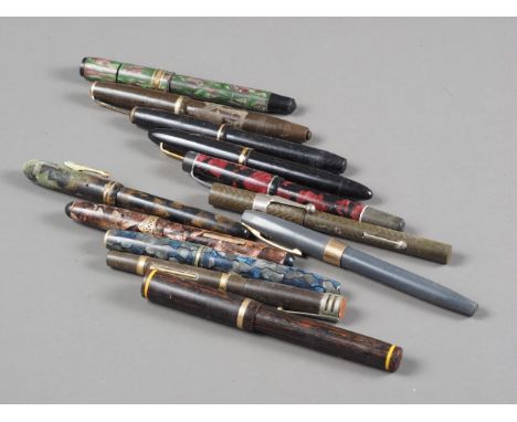 A quantity of vintage fountain pens, some with 14ct nibs various