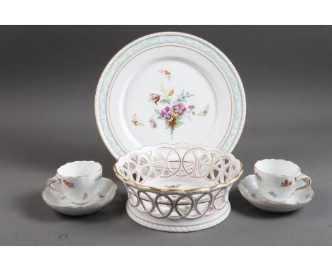 A pair of Meissen coffee cups and saucers with floral spray decoration, a Herend reticulated dish with painted birds on a bra