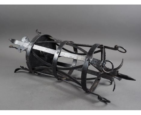 A wrought iron hanging lantern of 17th century design, 28" high