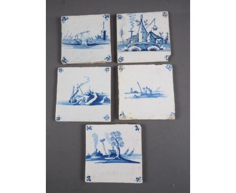 An 18th century English delft blue and white tile with bridge and tower, and four similar tiles with "lights"/"beacons"