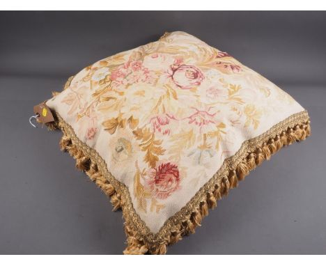 A French Aubusson cushion tapestry with floral designs on a natural ground, 19 1/2" x 20 1/2"