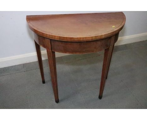 A Georgian mahogany and banded semi-circular fold-over top card table, 30" dia x 29 1/2" high (restored back stretchered rail