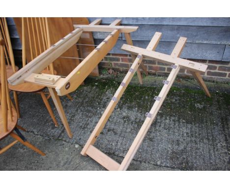 A vintage Ercol extending elm top dining table, on splay supports, 8" wide x 36" deep x 29 1/2" high (for restoration)Conditi