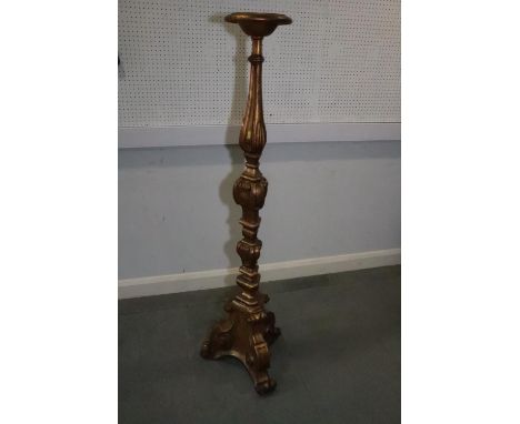 An 18th century design giltwood candlestick, 9" dia x 59" high